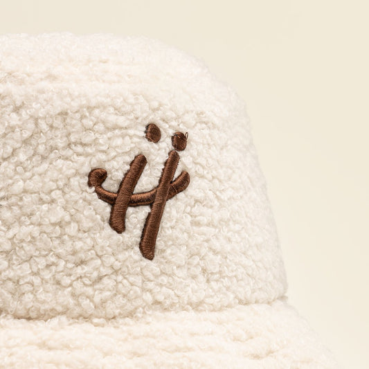 "The signature H" beige bucket hat