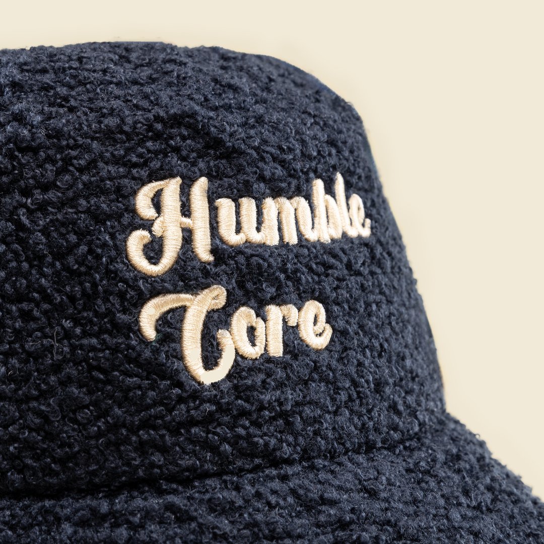 "Built strong core by bowing down" hat