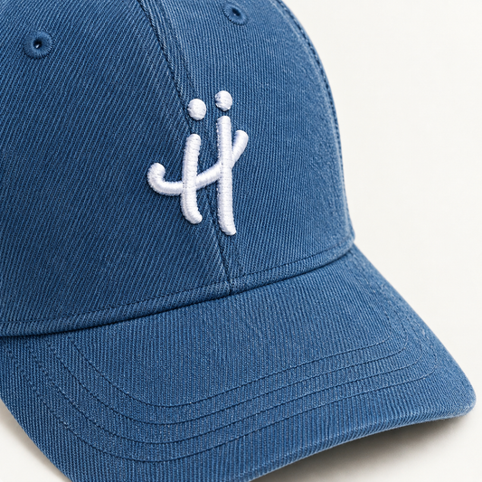 “The Signature H” washed denim