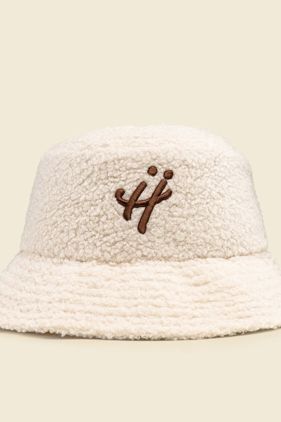 "The signature H" beige bucket hat