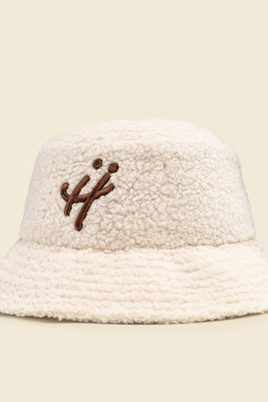 "The signature H" beige bucket hat