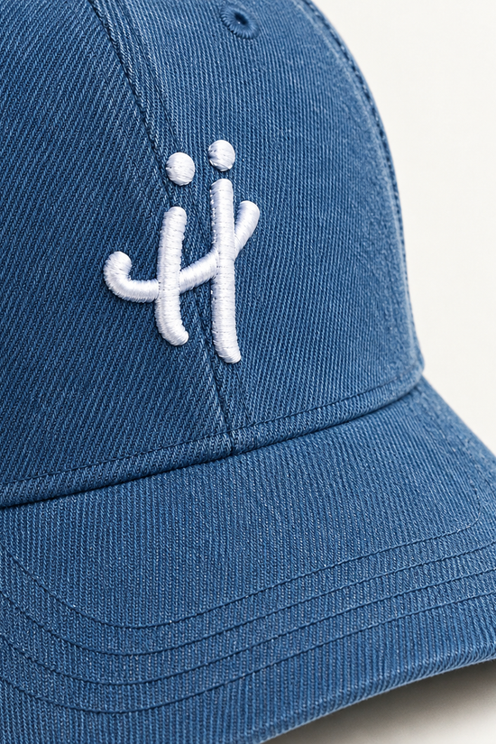 “The Signature H” washed denim