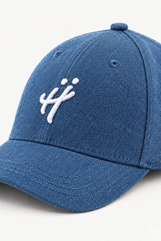 “The Signature H” washed denim