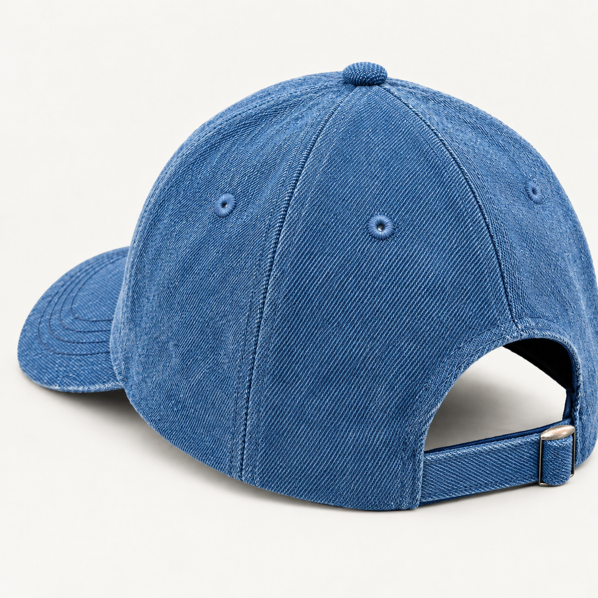 “The Signature H” washed denim