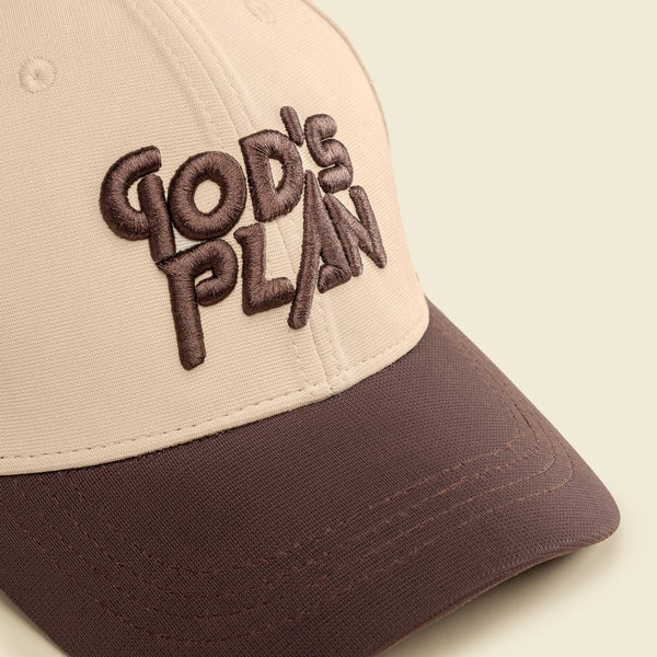 Beige and brown cap with 'God's Plan' text on a beige background
